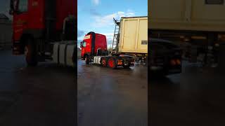 Red Volvo FM with square tanker on