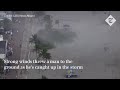 waterspout crashes on to beach full of people in miami florida