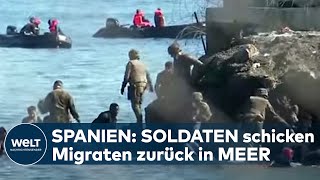 CEUTA: Dramatische Szenen am spanischen Strand - Soldaten schicken Migranten zurück ins Meer