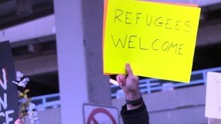 Activists protest Trump's immigration policy at JFK airport