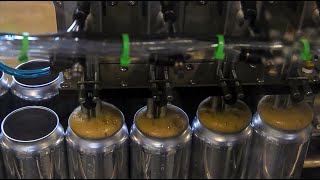 Big Grove Brewery uses Alpha Brewing Operation's Beer Cannon Canning Line.