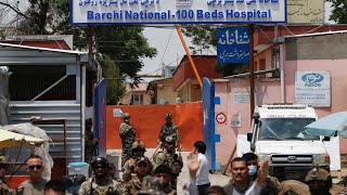 Dozens killed in attacks on Afghan maternity hospital, funeral