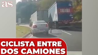 Un CICLISTA sale ILESO MILAGROSAMENTE tras queda EMPOTRADO entre DOS CAMIONES | AS