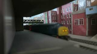 Model Railway: BR Blue 40145 pass Nottingham Station with a freight train