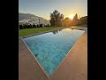 Piscina com cobertura laminar e tela stonetile elegance