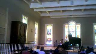 Bekah playing a 2 piano duet at a collaborative recital