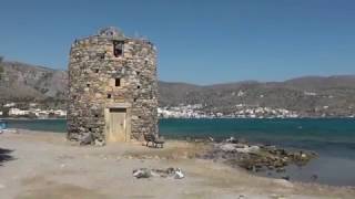 Ancient city of Olous and windmills of Elounda Crete.