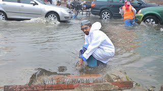 The Street Drain Masterclass Unclogging a Flooded Road