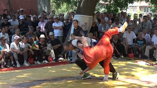 Chinese wrestling天津摔跤，老教练讲解穿跤衣的礼节，原来每个动作都有学问