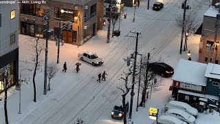 Snowy road intersection at twilight in Sapporo, Hokkaido, Japan | December 15, 2022