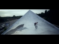 bmx riding on a roof with a helicam