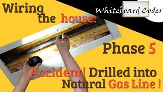 Wiring the house: Phase 5 Accidentally drilling into a gas line