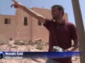 libyan front line village braves daily onslaught