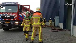 Machine in brand in bedrijfshal in Haaksbergen