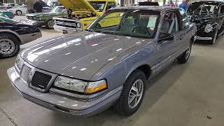 1991 Pontiac Grand Am in near showroom condition ready to change hands in Indianapolis Mecum 2023.