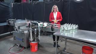 Krones Automatic Inline Cold Glue Spot/Wrap Labeler Demonstration