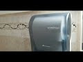 how to open the enmotion paper towel dispenser without a key