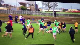 Two teams fight at GAA game (Gaelic Football)