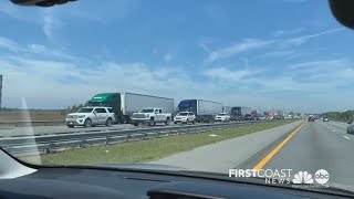 Coronavirus highway check points in Florida cause heavy traffic on I-95