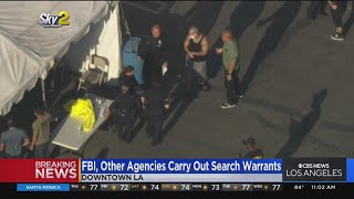 FBI, LAPD and others carry out dozens of search warrants in gang sweep