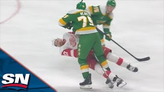 Wild's Ryan Reaves Catches Red Wings' Filip Hronek With MASSIVE Open-Ice Hit
