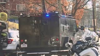 DC officers shot serving animal cruelty arrest warrant; gunman remains barricaded | NBC4 Washington