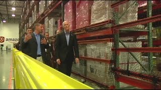 Gov. Rick Scott tours Lakeland Amazon center