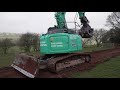 kobelco excavator with six way dozer blade