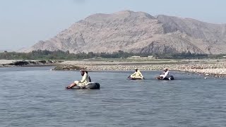 These Afghan teachers float to school in paddling rafts