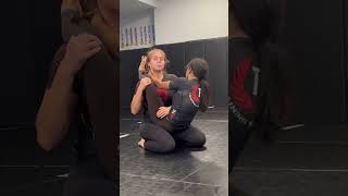 Women spar during Jiu Jitsu training!