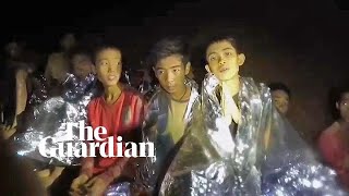 Boys trapped in Thailand comforted by rescuers