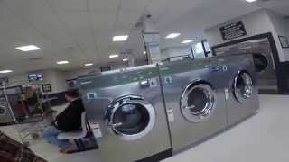 Awesome City Scape Huebsch Laundry Equipment Humming Along