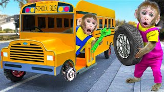 KiKi Monkey pretends to be a fake Car Mechanic fix School Bus Wheel on the road | KUDO ANIMAL KIKI