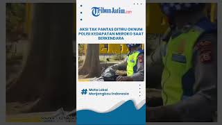 AKSI TAK PANTAS DITIRU OKNUM POLISI KEDAPATAN MEROKO SAAT BERKENDARA