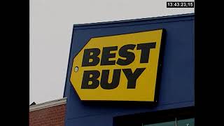 Shopping at a Best Buy store in 2005