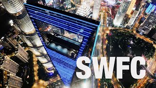 Stunning night aerial over Shanghai World Financial Center (SWFC) 4K