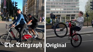 Hundreds of dangerous cyclists run red lights and nearly hit public at London junction