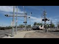 BNSF Hi-Railer Crosses Through The McHenry Avenue Railroad Crossing. Escalon, CA