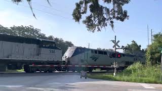 Amtrak Auto Train 53 with Dash 8 crossing Ponce De leon Blvd.De leon Springs