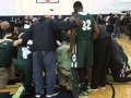 New Haven players and staff huddle after loss to Detroit Henry Ford in Class B quarterfinal at Marys