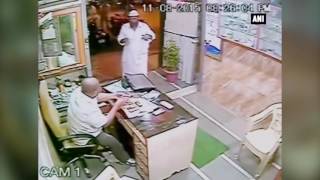 CCTV footage - A customer saves physically challenged Mumbai shopkeeper from sword attack