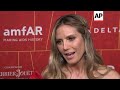 Stars look stunning on the amfAR red carpet