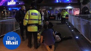 Paramedics attend to revellers as Black Eye Friday hits Britain - Daily Mail