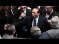 Berlusconi scrapes through confidence vote