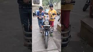 Shubhojeet and his best friend Darsh starting Royal Enfield Bullet \