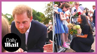 Meghan Markle and Prince Harry greet crowds outside of Windsor Castle after Queen's death