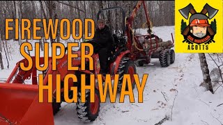 Cutting Firewood on a Winter Road with Kubota Tractor and Kranman ATV Logging Trailer  E146