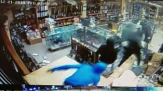 Seven Suspects Smash and Grab Gun Store | Surveillance Video