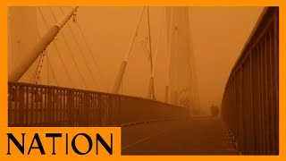 Thick sheet of orange dust blankets Iraq's capital Baghdad