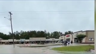 Body found Monday afternoon in an SUV that was swept away and submerged in southern Mississippi